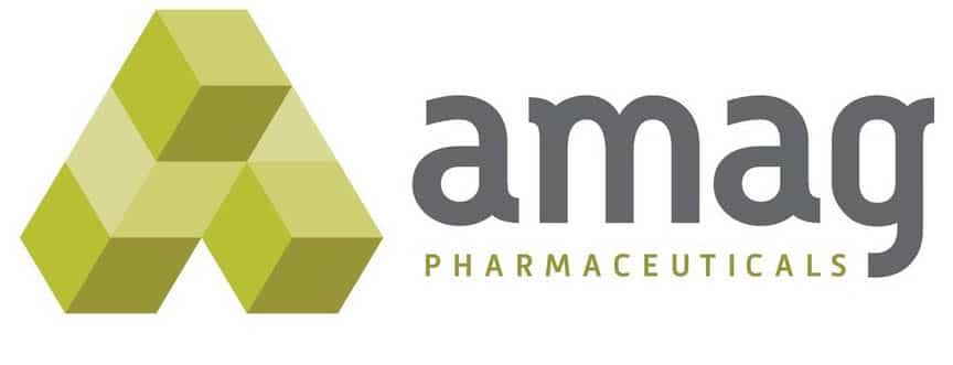 The AMAG Pharmaceuticals logo features the word "amag" in lowercase, gray letters with "PHARMACEUTICALS" in smaller, uppercase, green letters below. To the left of the text is a geometric design consisting of three green and yellow shaded cubes connected to form a larger, triangular shape.