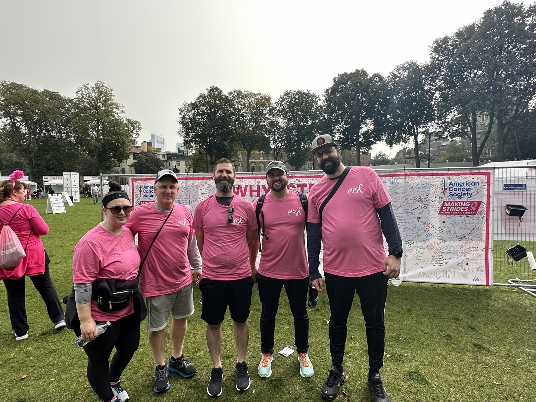Group photo of the PTP team wearing pink t-shirts at the Making Strides Against Breast Cancer Walk in Boston, 2023.